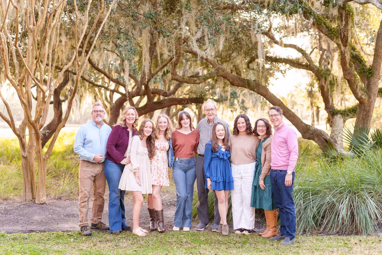 Extended family beneath the oak trees at DeBordieu Colony.