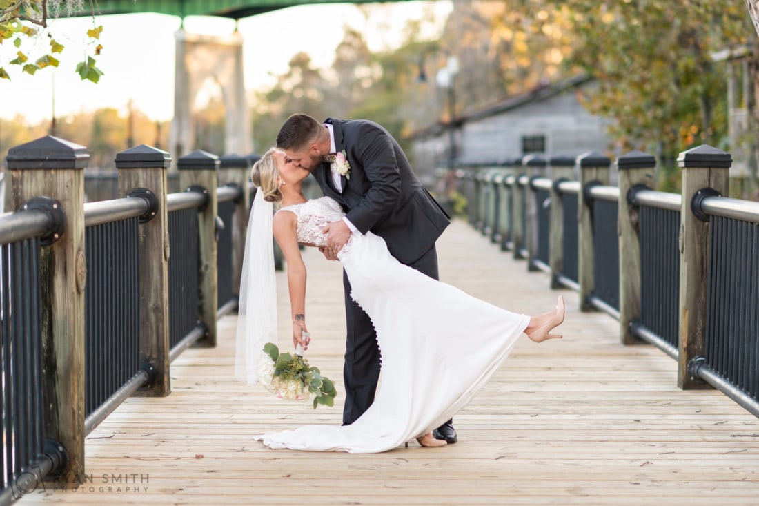 Dip back for a kiss on the boardwalk - Conway River Walk