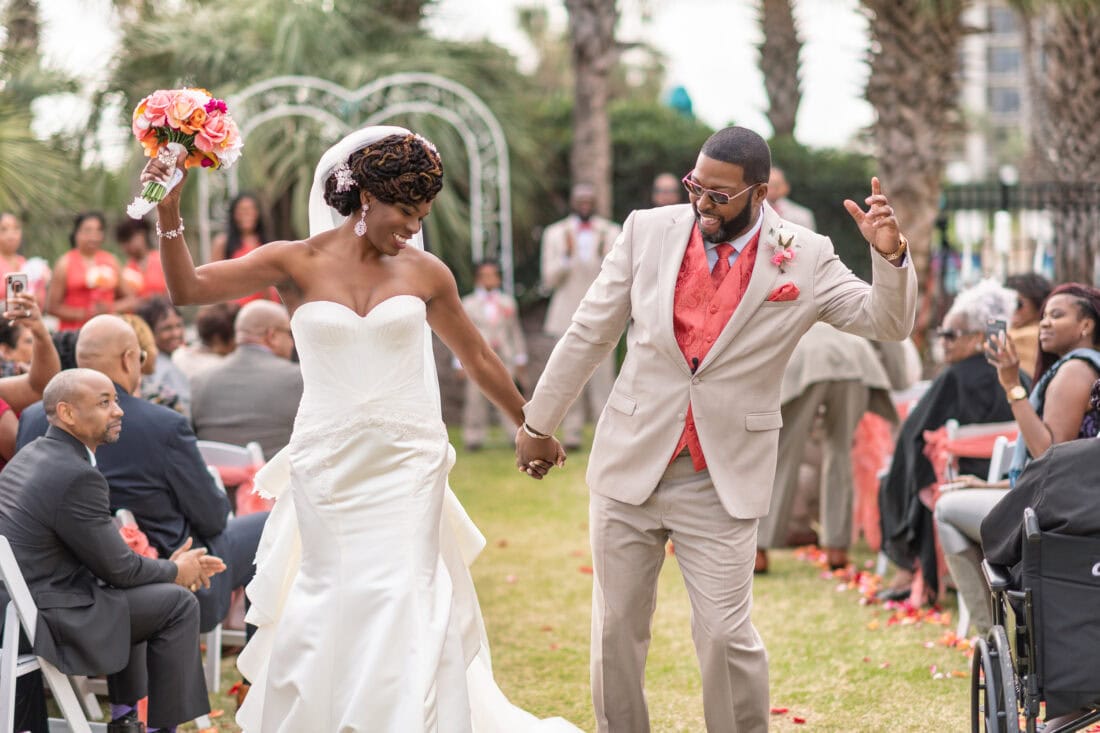 Very happy bride and groom leaving the ceremony - Doubletree Resort - Myrtle Beach