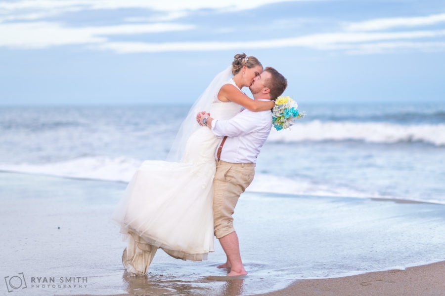 Rainy summer wedding day at the Atalaya Castle in Huntington Beach ...