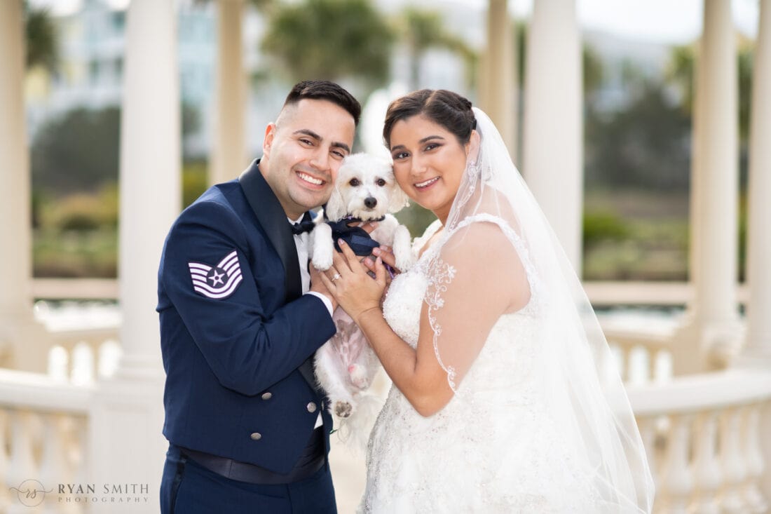 Bride and groom with their three leg doggie ring bearer  - 21 Main Events at North Beach