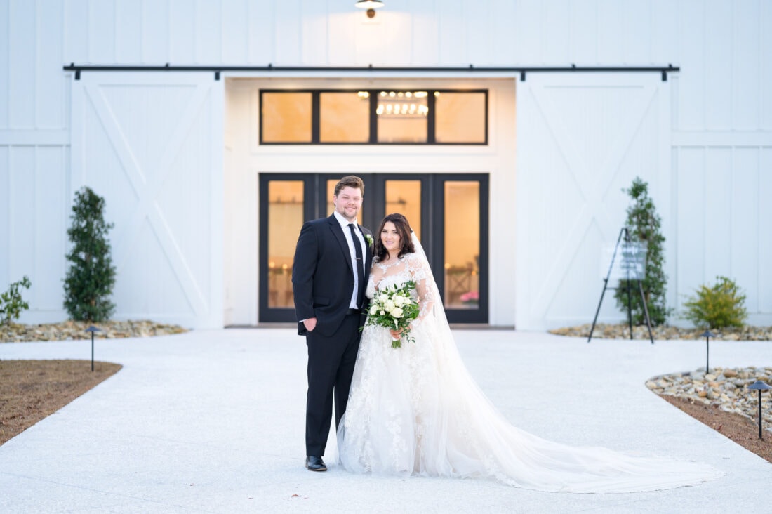 Portrait in front of the venue - The Venue at White Oaks Farm