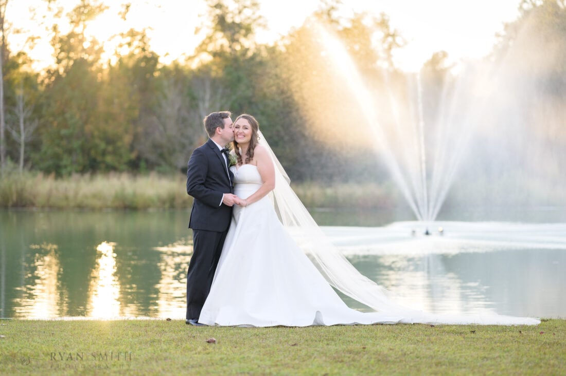 Kiss on the cheek  - The Venue at White Oaks Farm