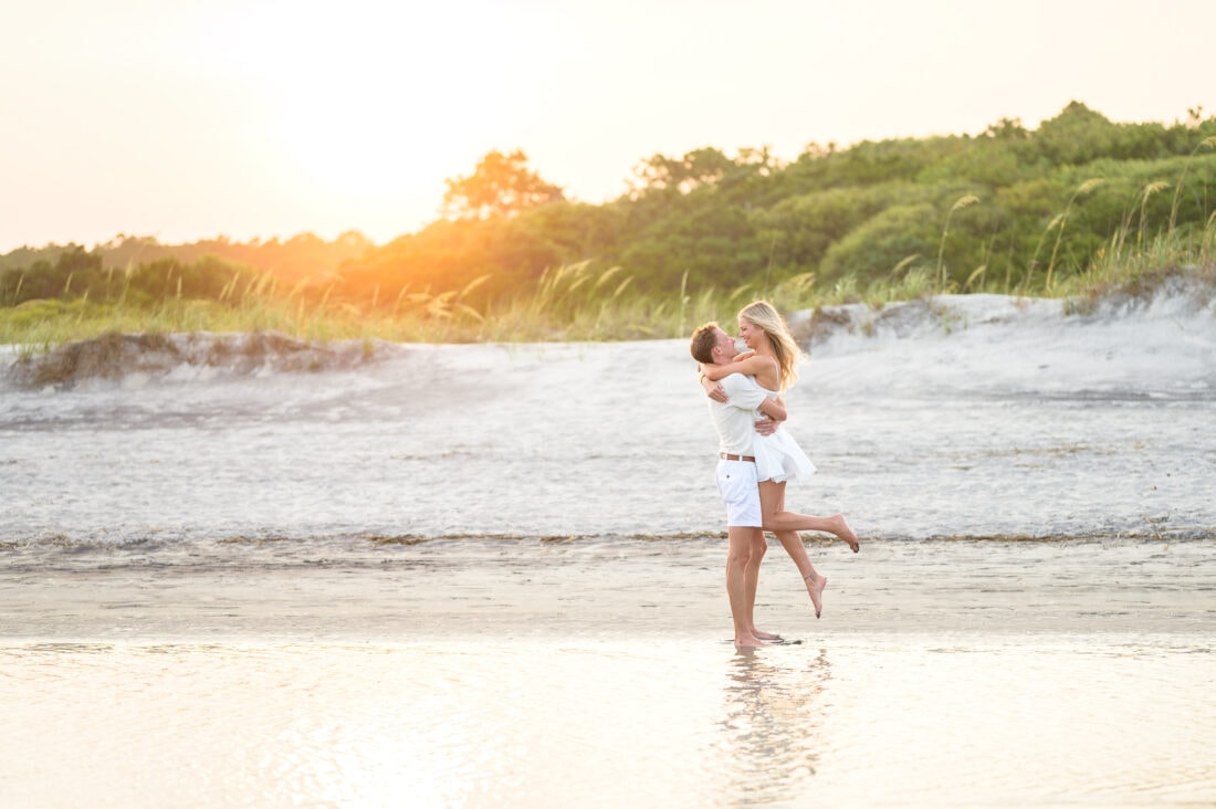 Lift into the air in front of the sunset - Huntington Beach State Park