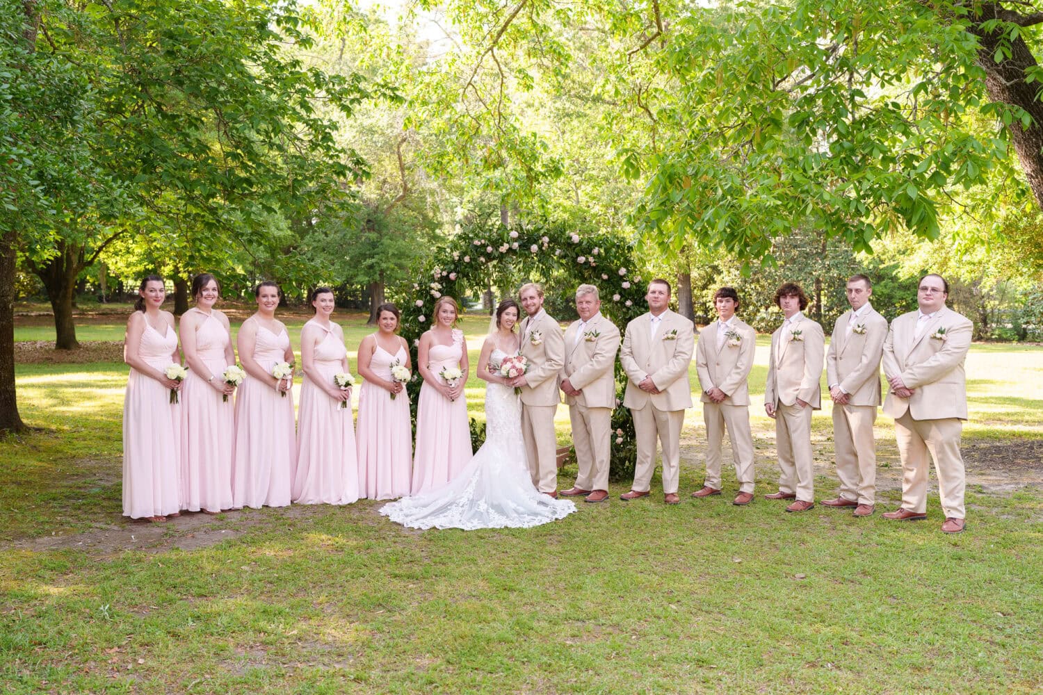 Big wedding party under the trees - Tanglewood Plantation