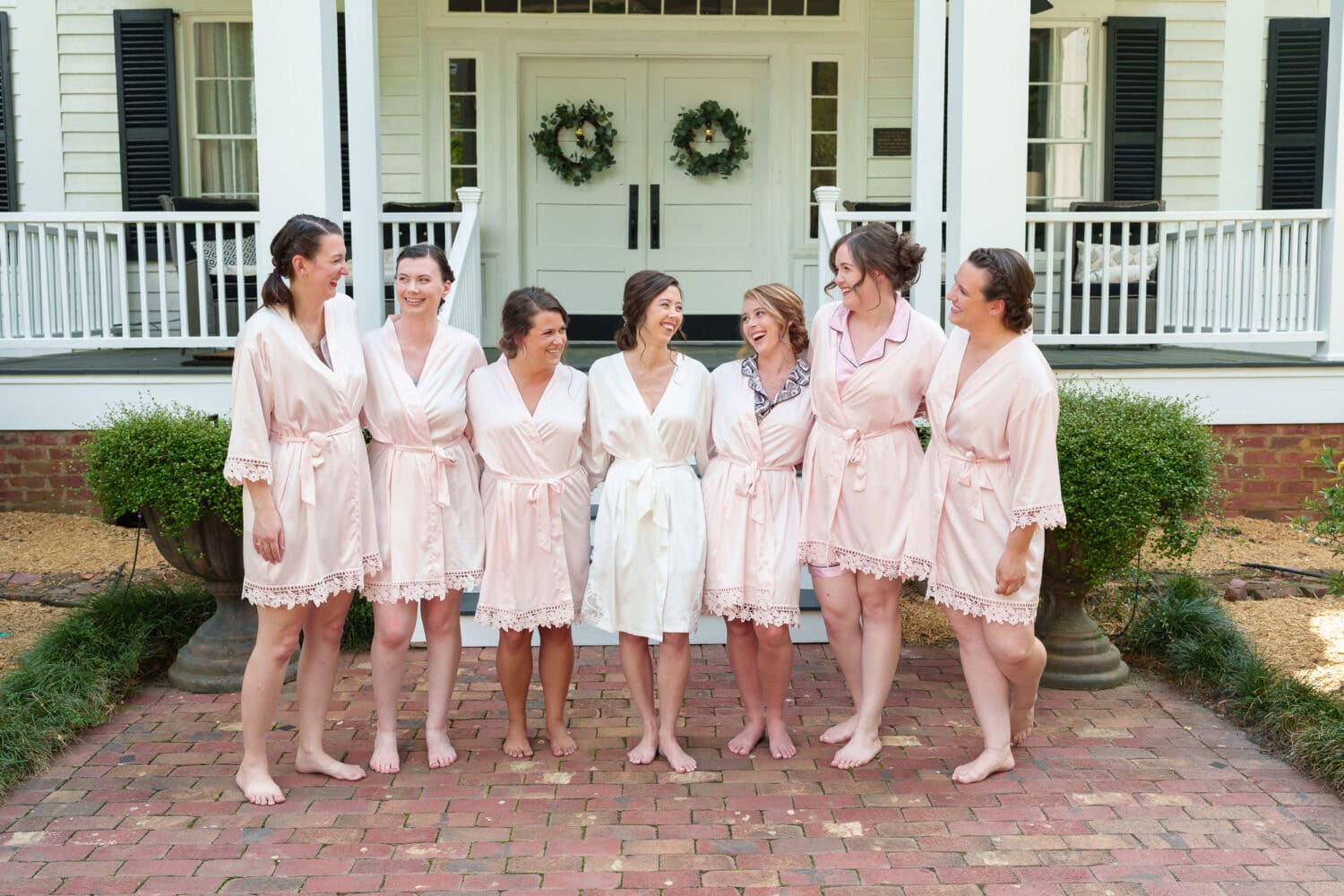 Bridesmaids in robes on the front porch - Tanglewood Plantation