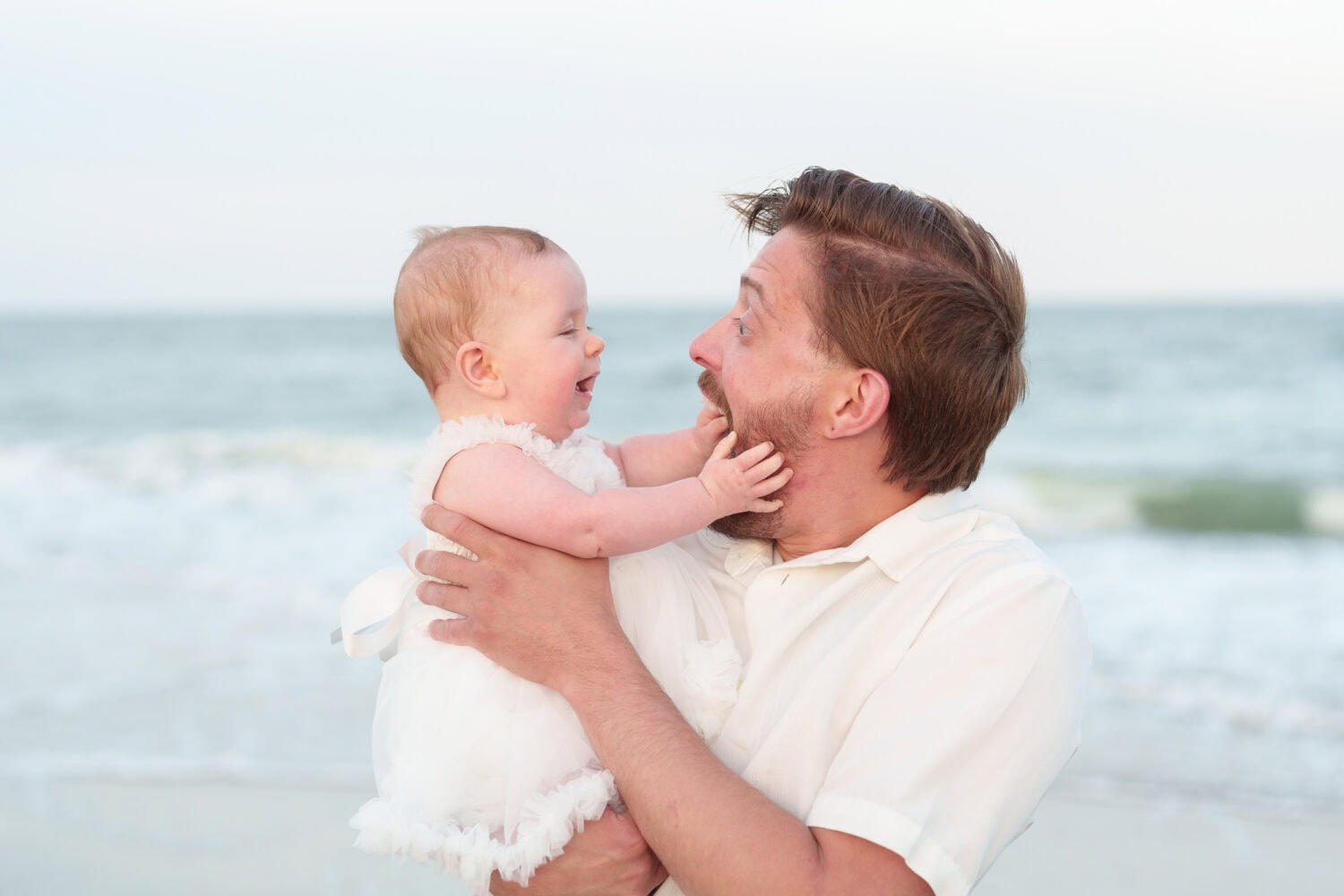 Baby girl loves her daddy - Huntington Beach State Park