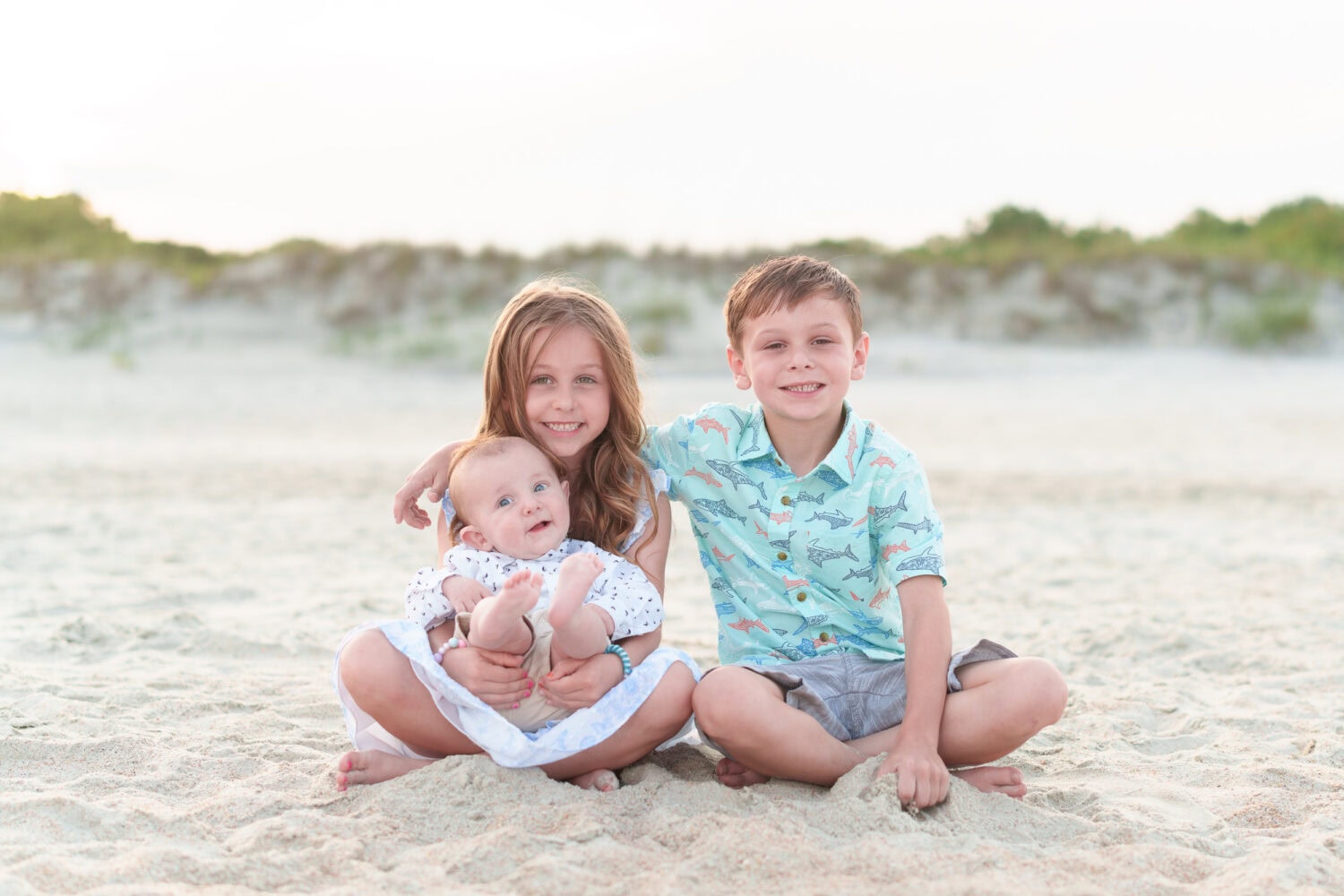 Brother and sister with baby cousin on the beach - Huntington Beach State Park