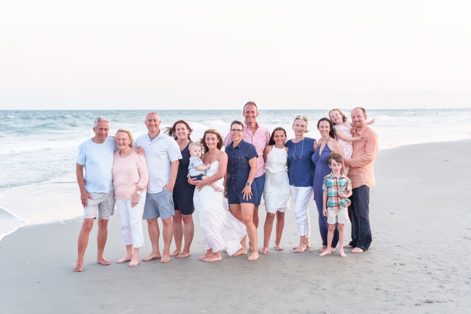 Big family at sunset in front of the ocean - North Myrtle Beach