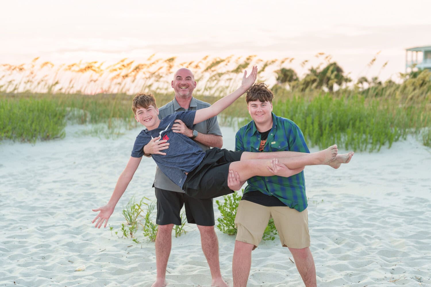 Brothers having fun with dad - Garden City Beach