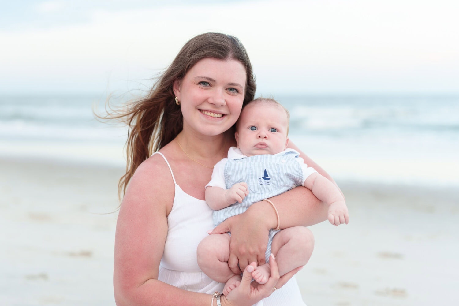 Mom and baby by the ocean - Huntington Beach State Park