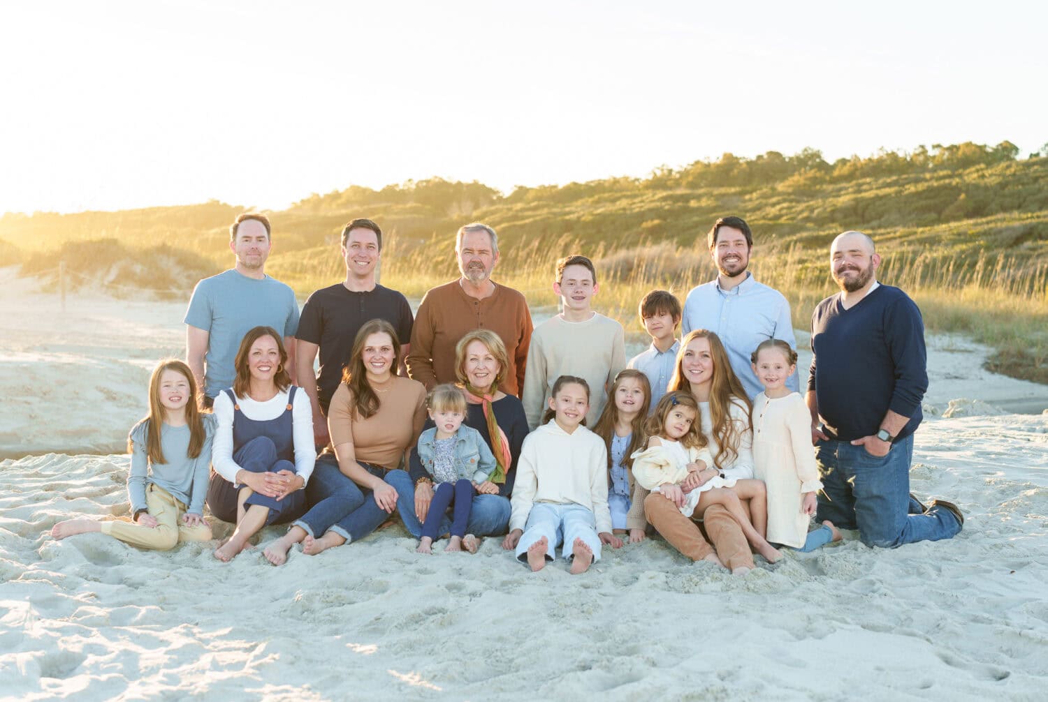 Big family group sitting in front of the dunes - Myrtle Beach State Park