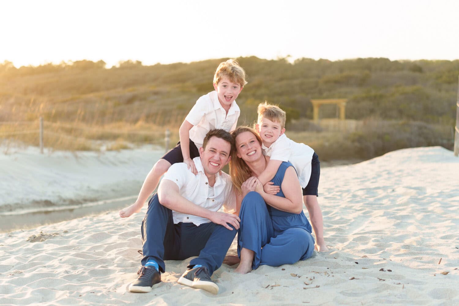 Brothers having fun with mom and dad by the dunes - Myrtle Beach State Park