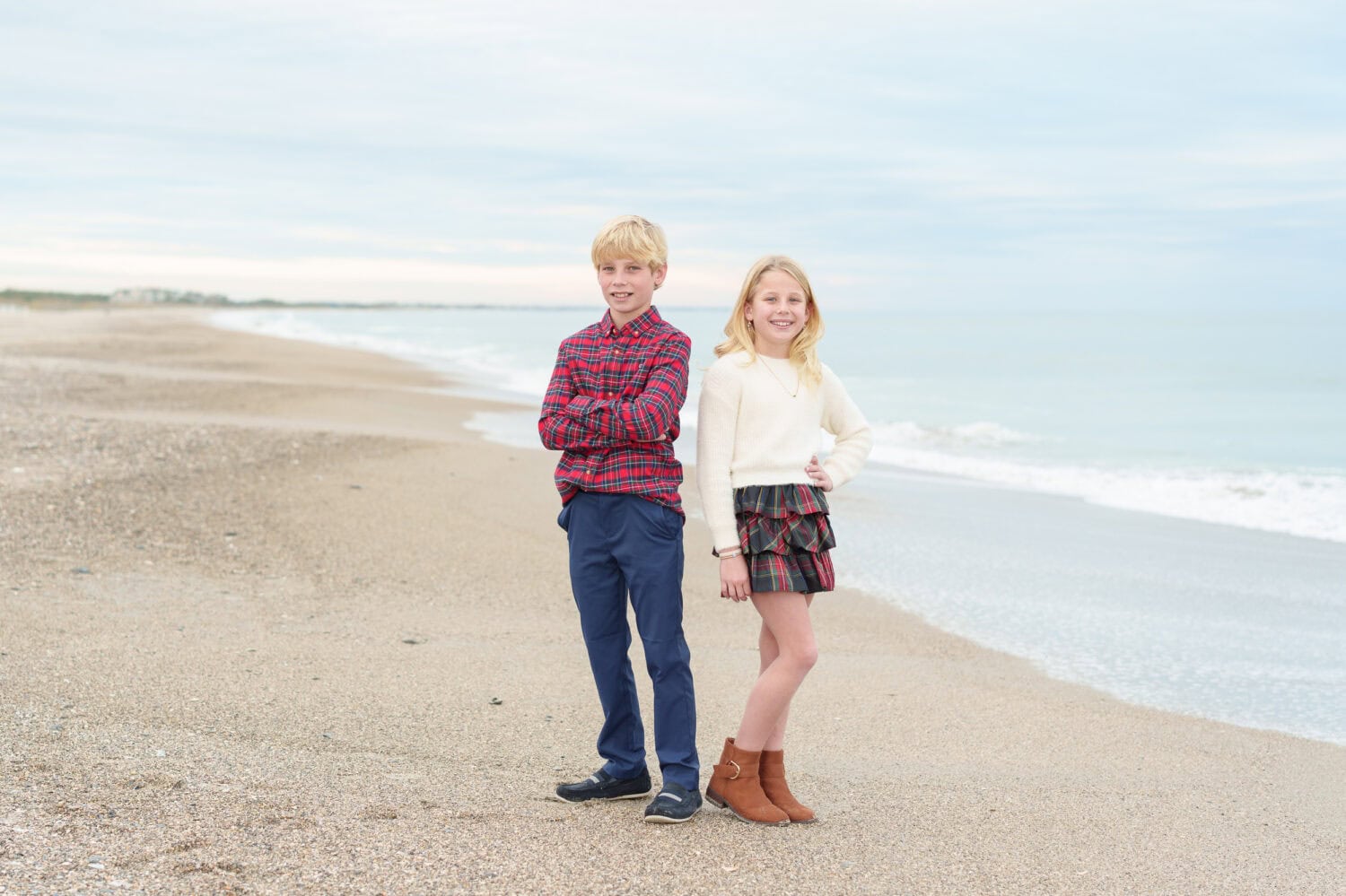 Family group in thier winter outfits on the beach - Debordieu