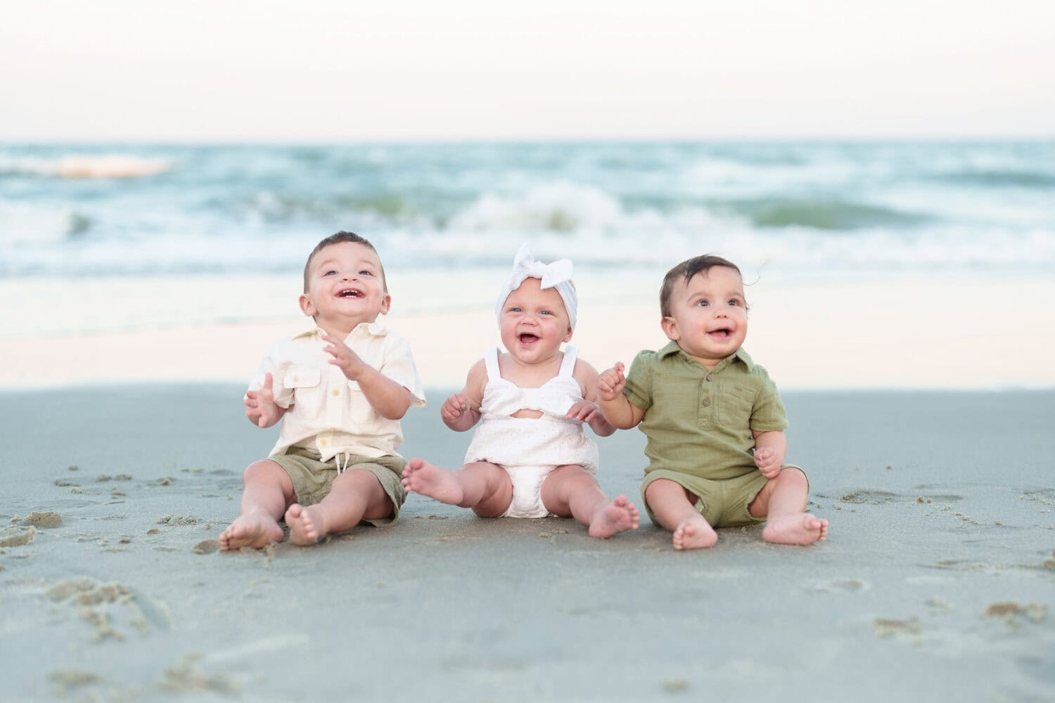 Family pictures with cute toddlers behind their beach house - Myrtle Beach