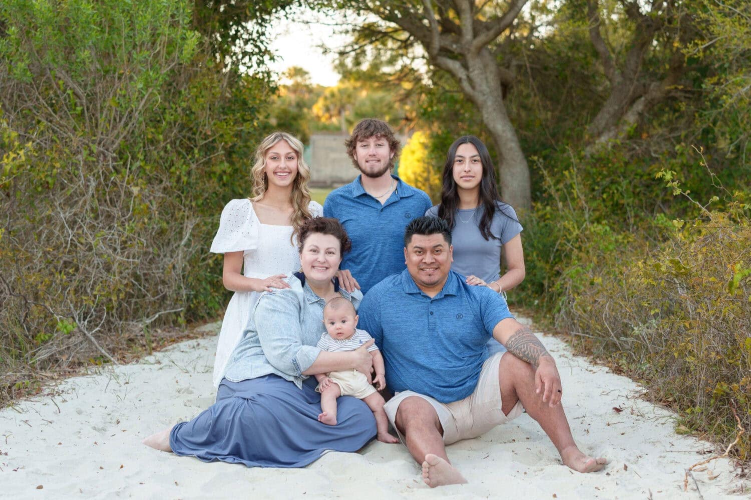 Family with older children and a new baby boy - Huntington Beach State Park