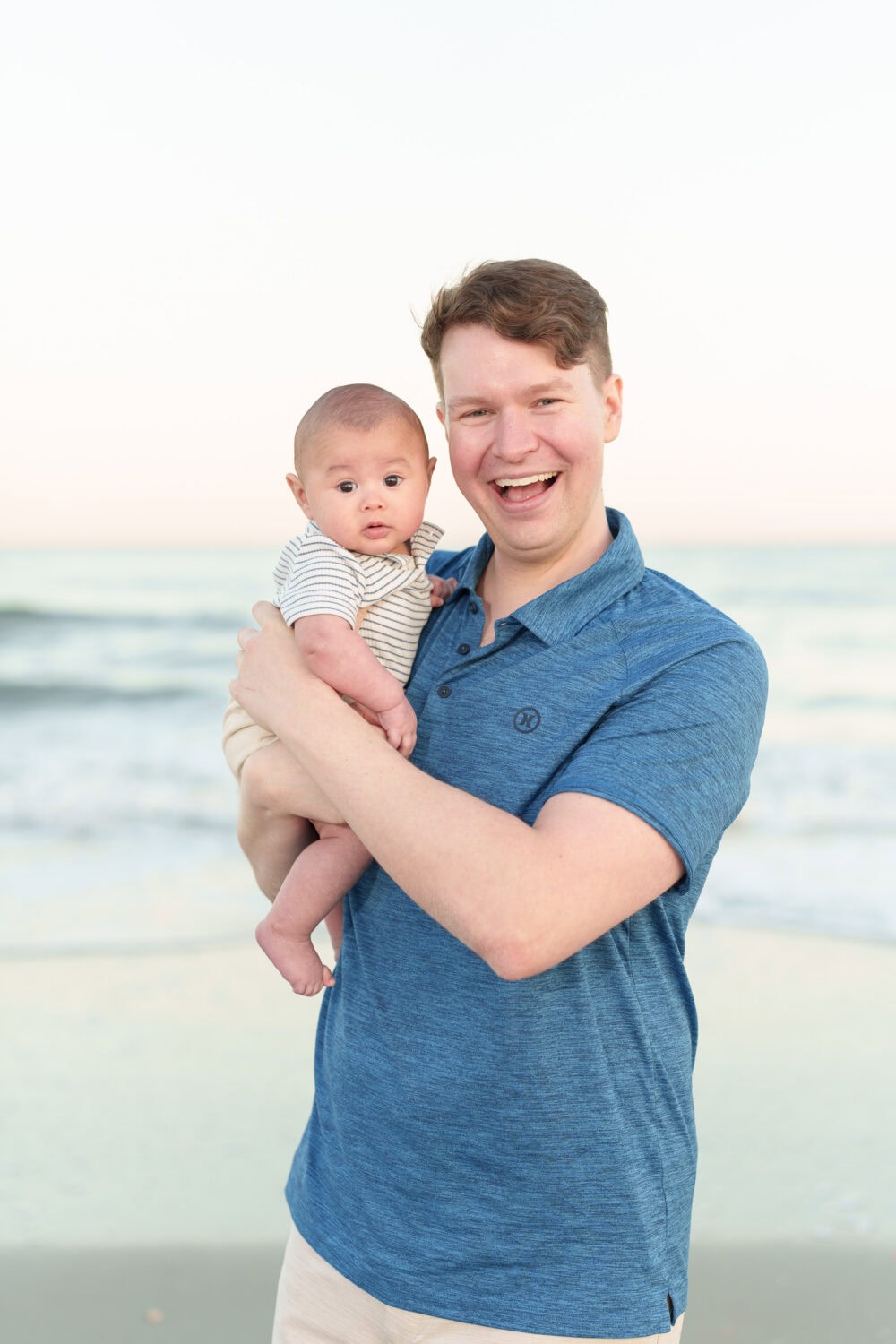 Family with older children and a new baby boy - Huntington Beach State Park