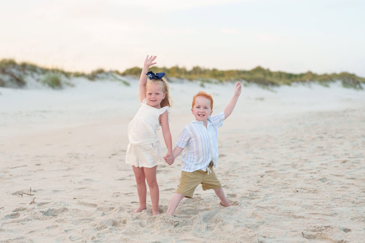 Little brother and sister having fun on the beach - Huntington Beach State Park - Pawleys Island