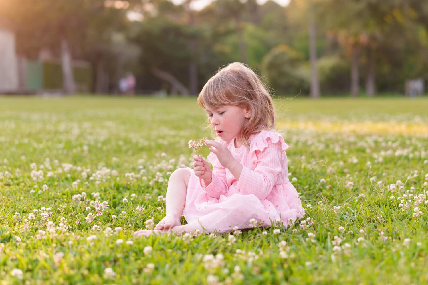 Little girl sitting in the grass - Huntington Beach State Park - Pawleys Island