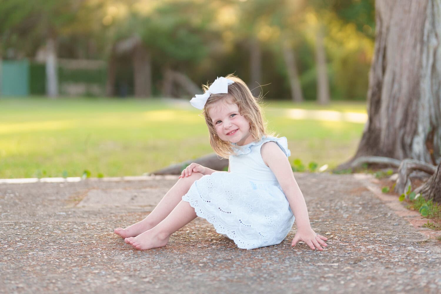 Little girl sitting under the tree - Huntington Beach State Park - Pawleys Island