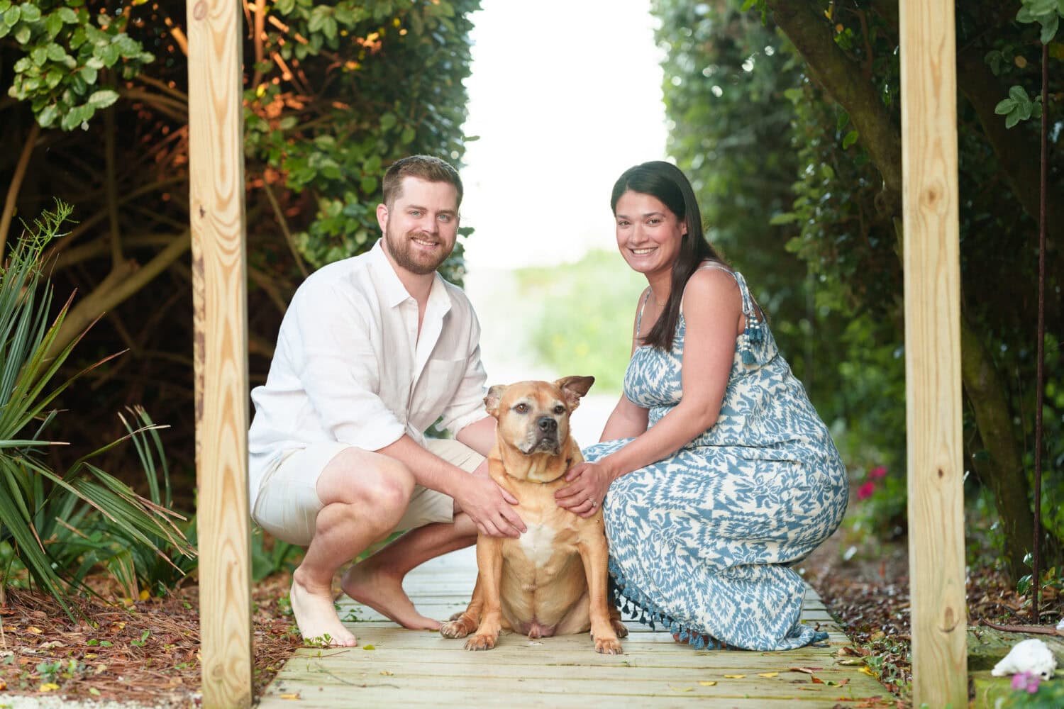 Maternity photos with their dog on the beach - Pawleys Island Beach House