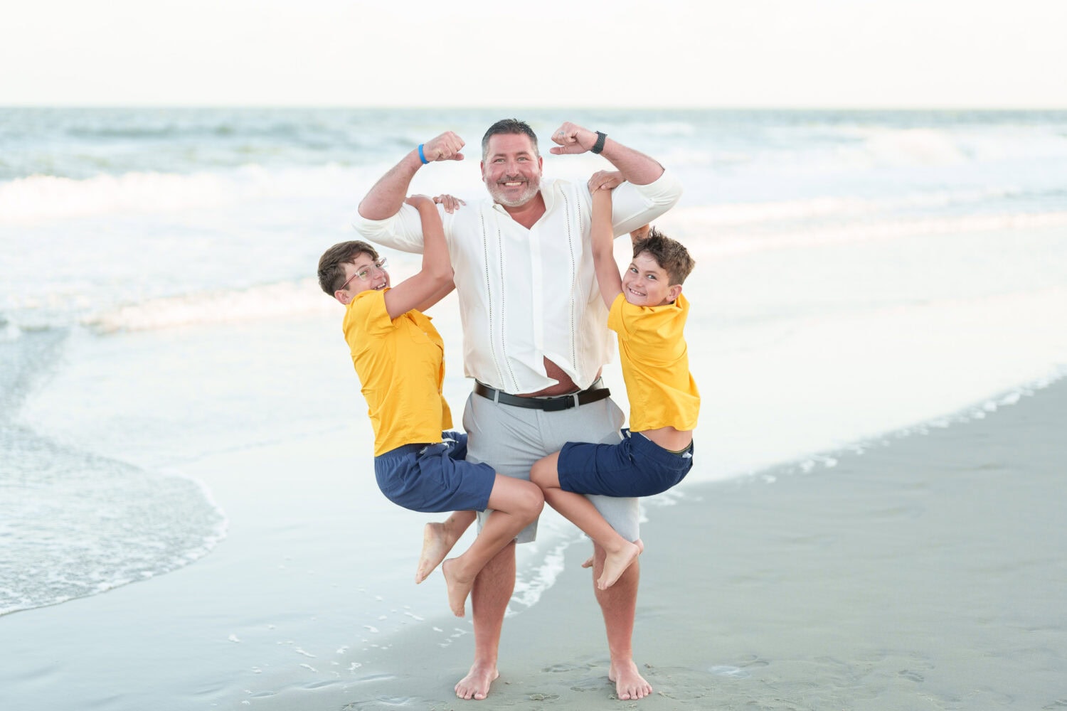 Repeat clients family pictures behind their resort - North Myrtle Beach