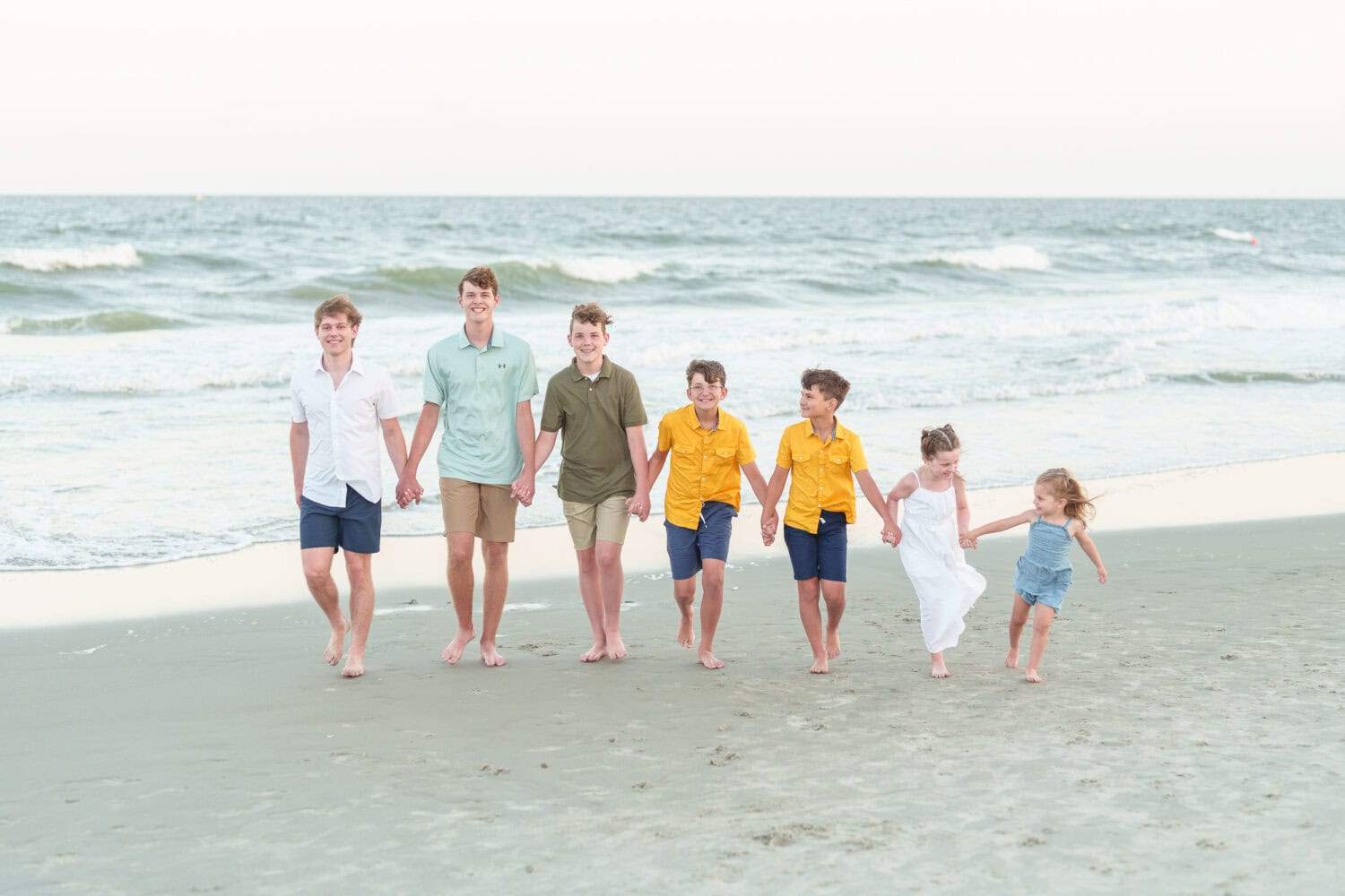 Repeat clients family pictures behind their resort - North Myrtle Beach