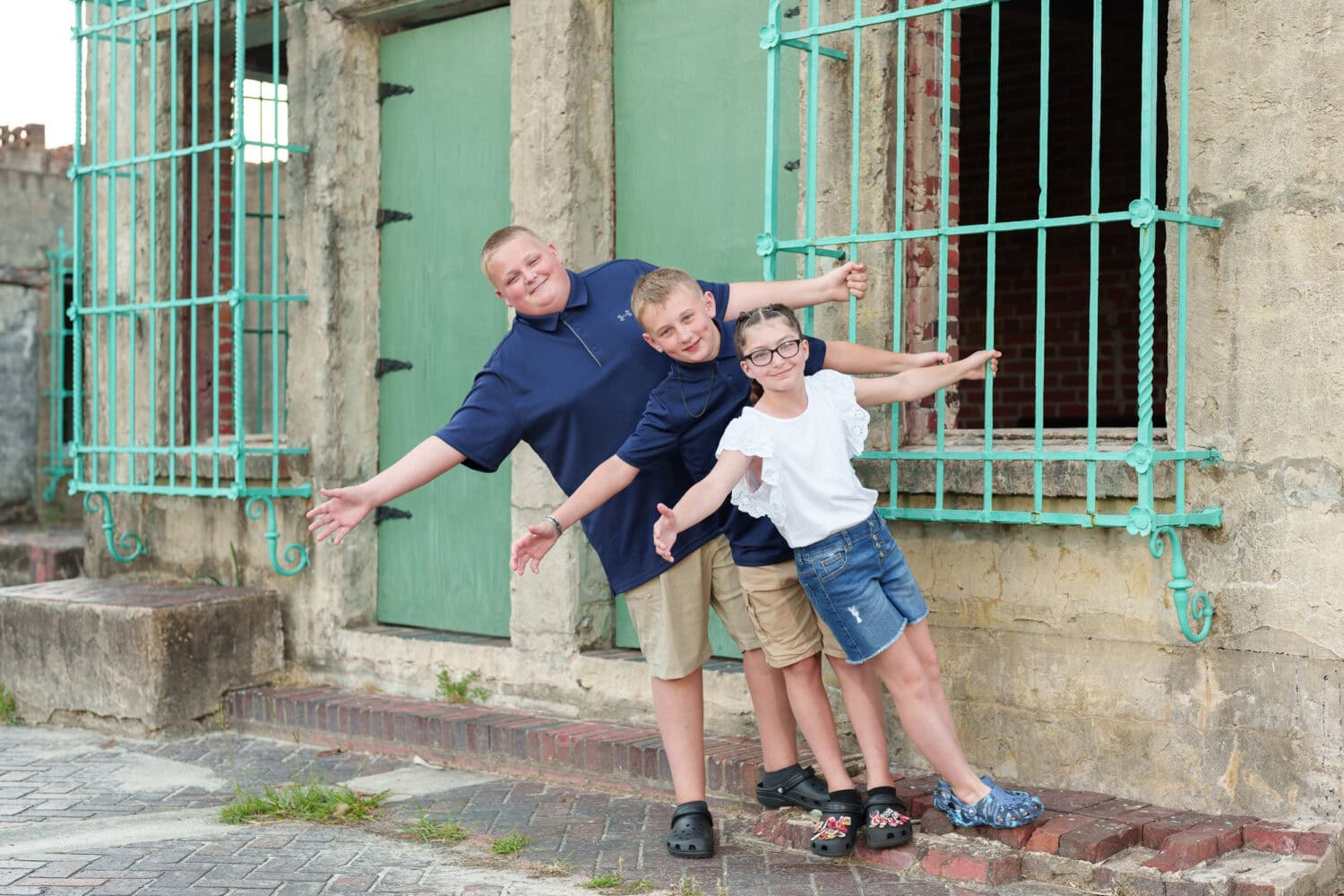 Siblings having fun by the castle window - Huntington Beach State Park - Pawleys Island