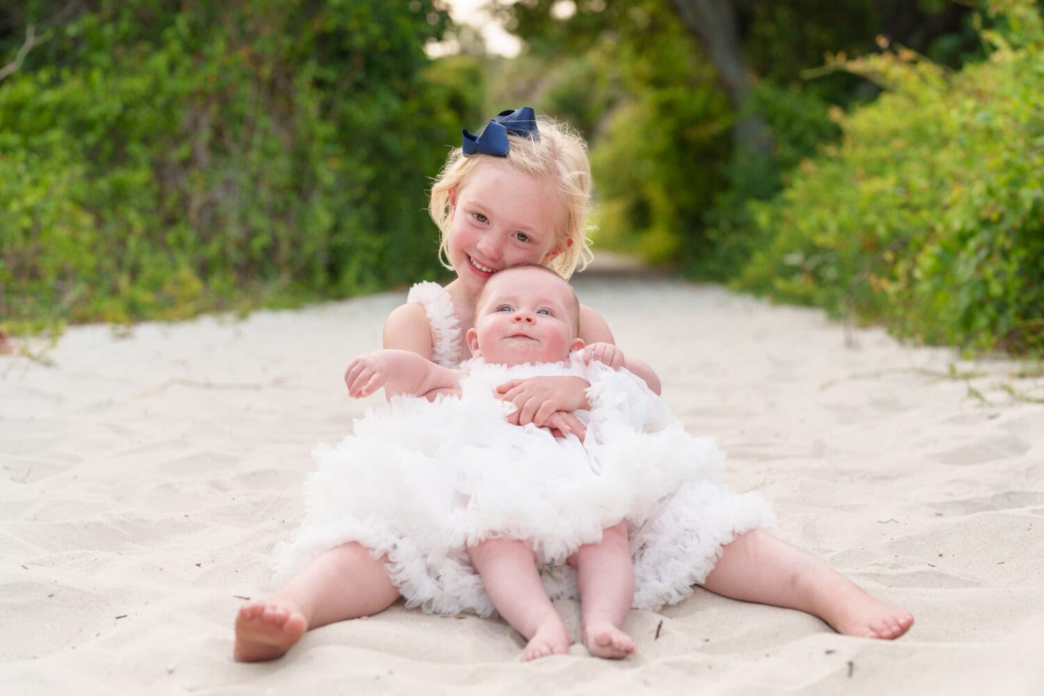 Sister holding the new baby on the beach path - Huntington Beach State Park - Pawleys Island