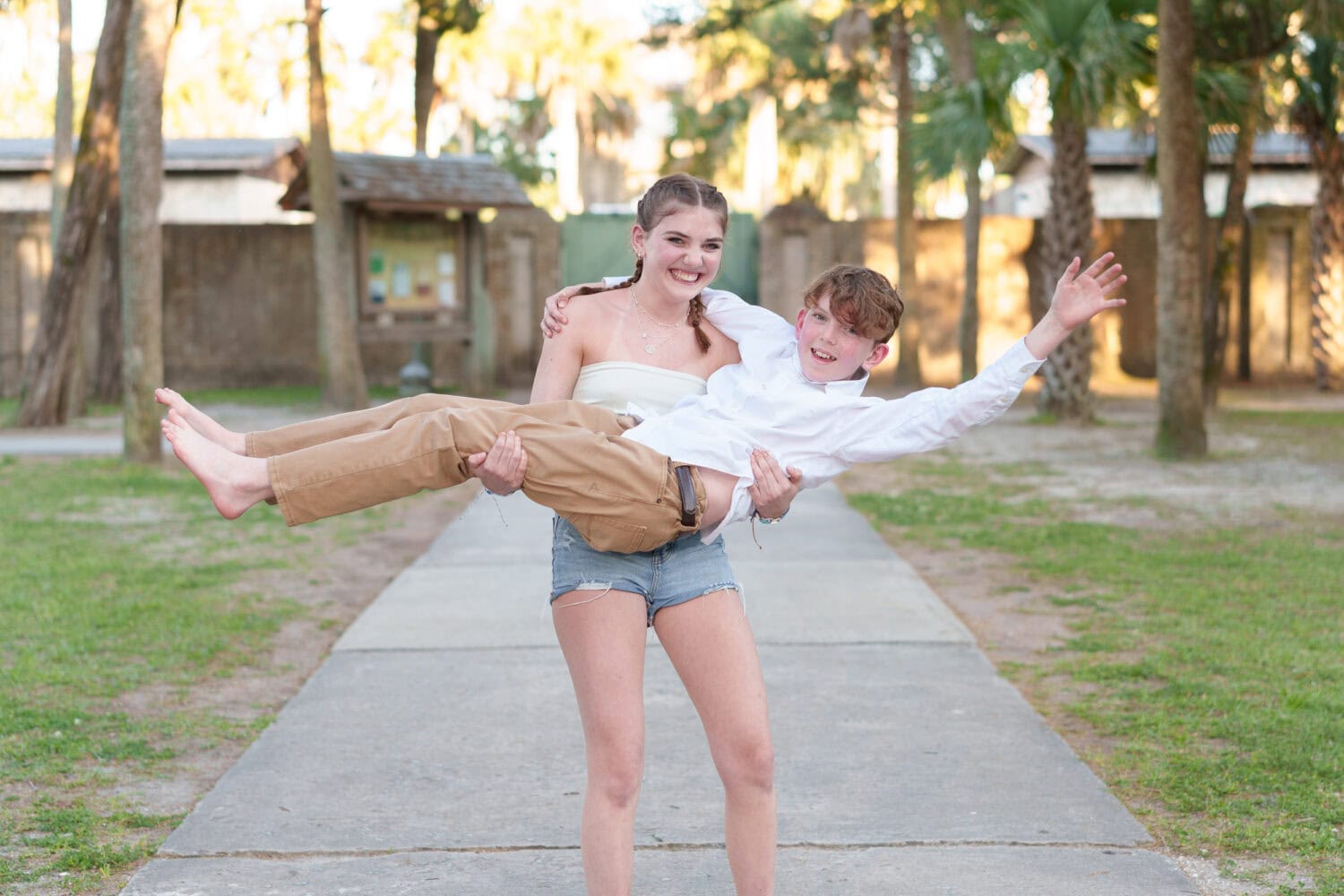 Sister lifting up little brother - Huntington Beach State Park - Pawleys Island