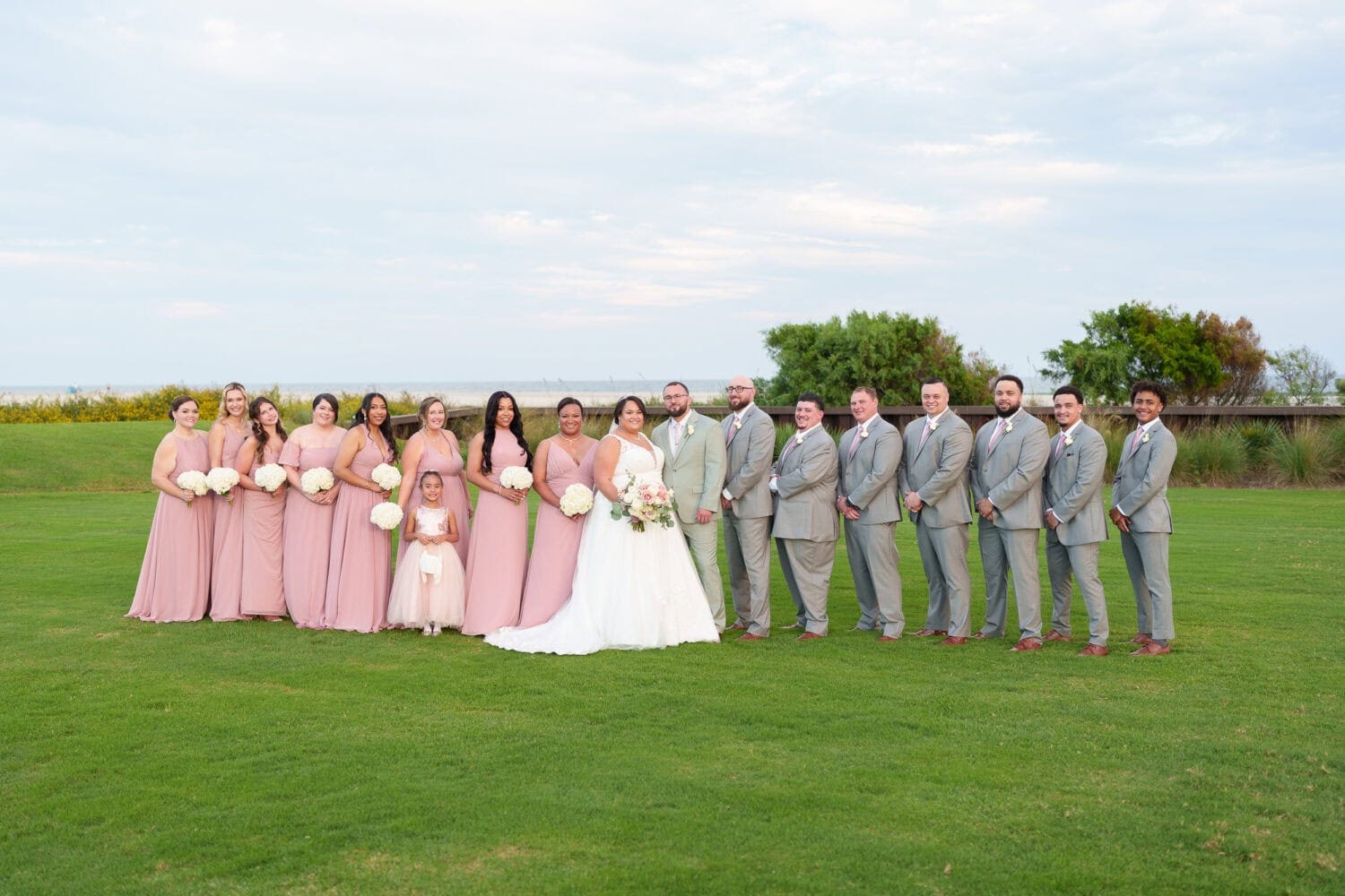 Big wedding party together after the ceremony - Dunes Golf & Beach Club