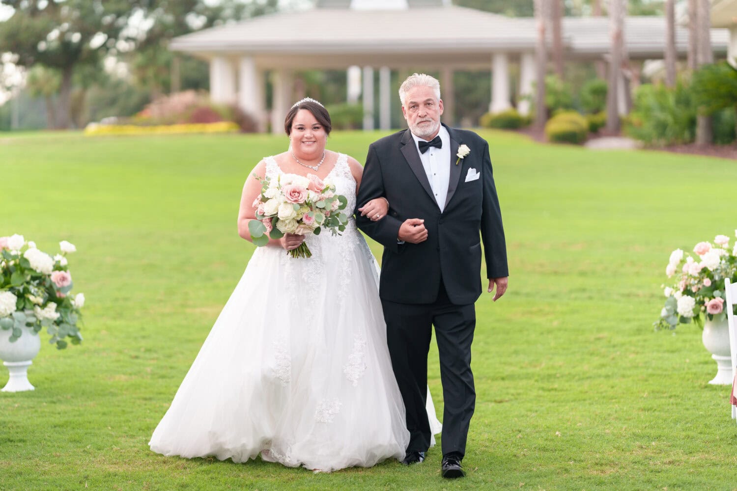 Bride and father walking down the aisle - Dunes Golf & Beach Club