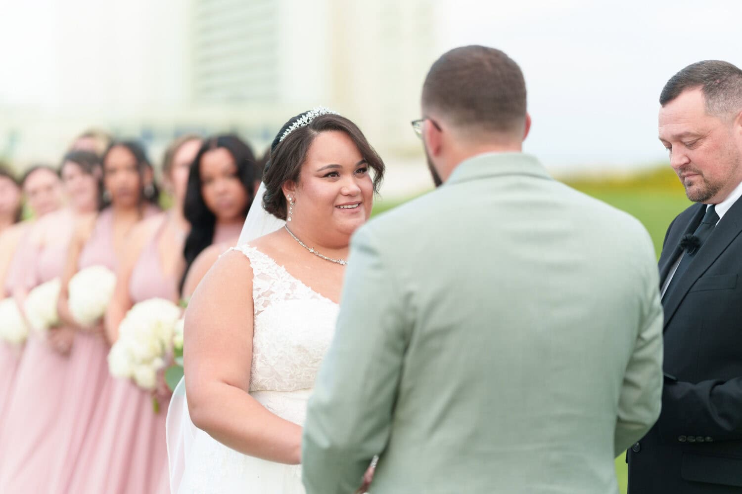 Bride looking at groom during the vows - Dunes Golf & Beach Club