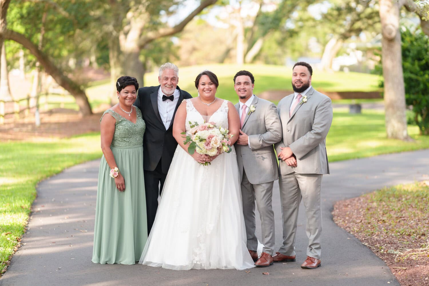 Bride with her parents and brothers - Dunes Golf & Beach Club