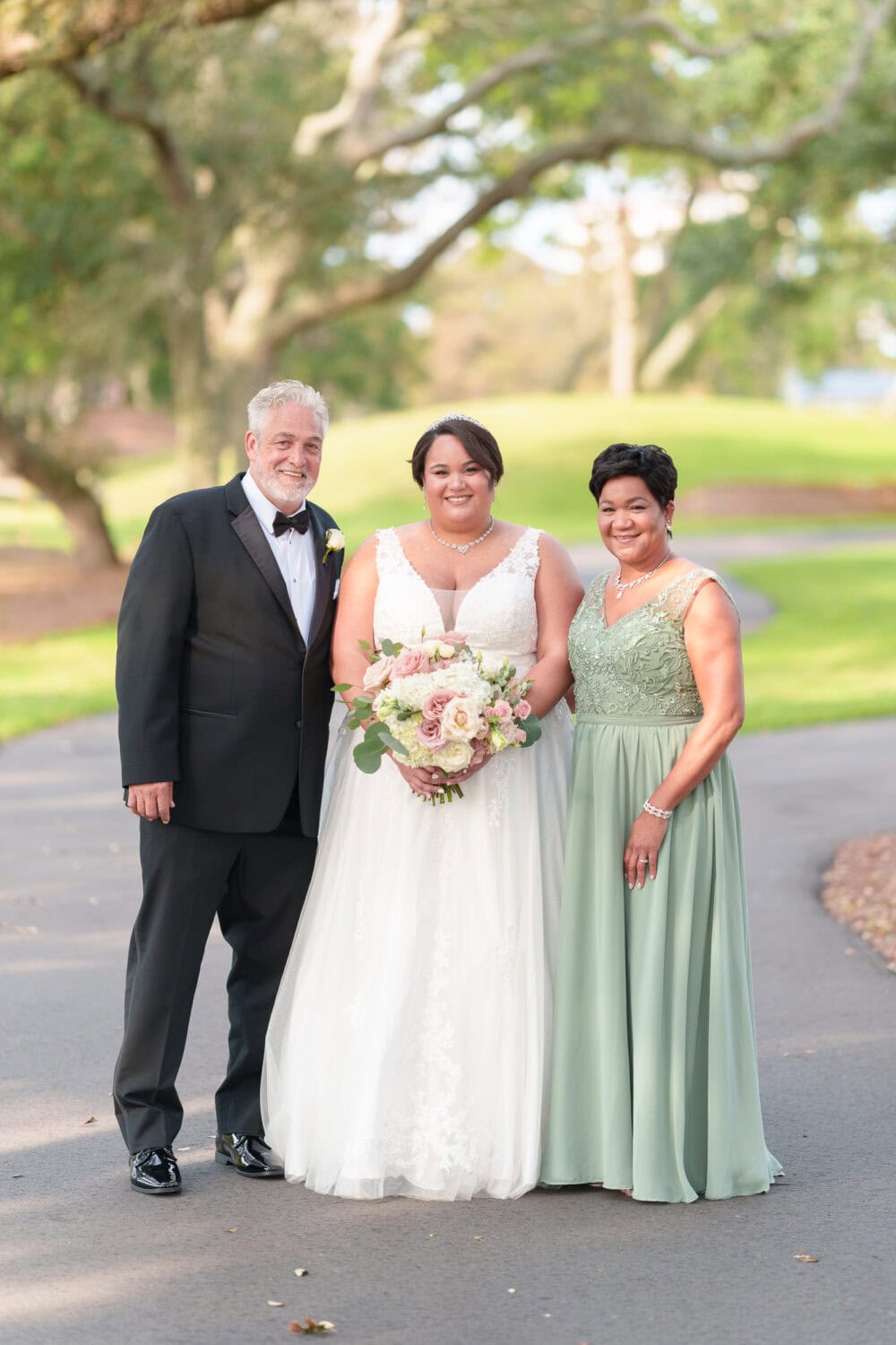 Bride with mother and father - Dunes Golf & Beach Club