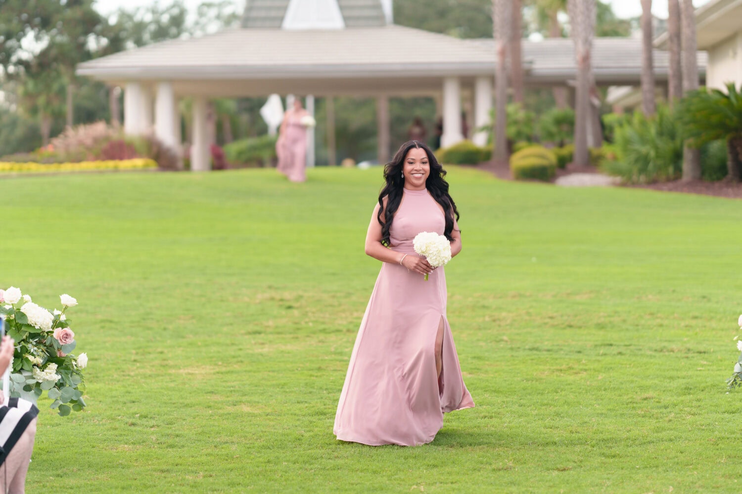 Family and wedding party walking to the ceremony - Dunes Golf & Beach Club