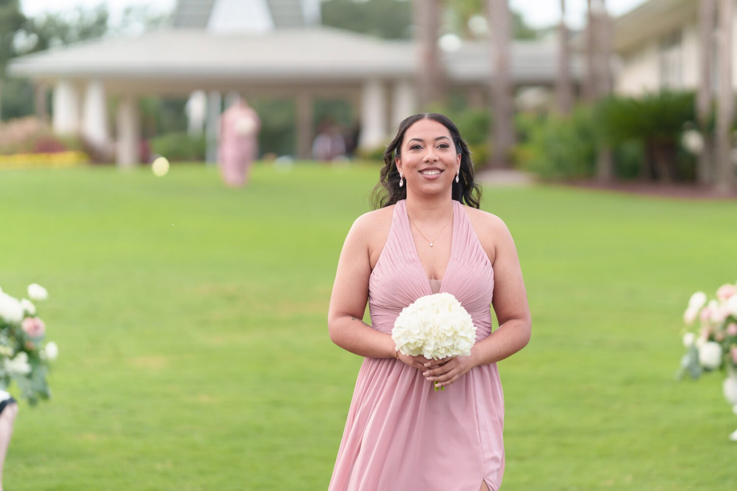 Family and wedding party walking to the ceremony - Dunes Golf & Beach Club