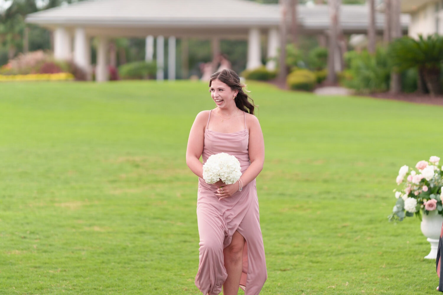 Family and wedding party walking to the ceremony - Dunes Golf & Beach Club