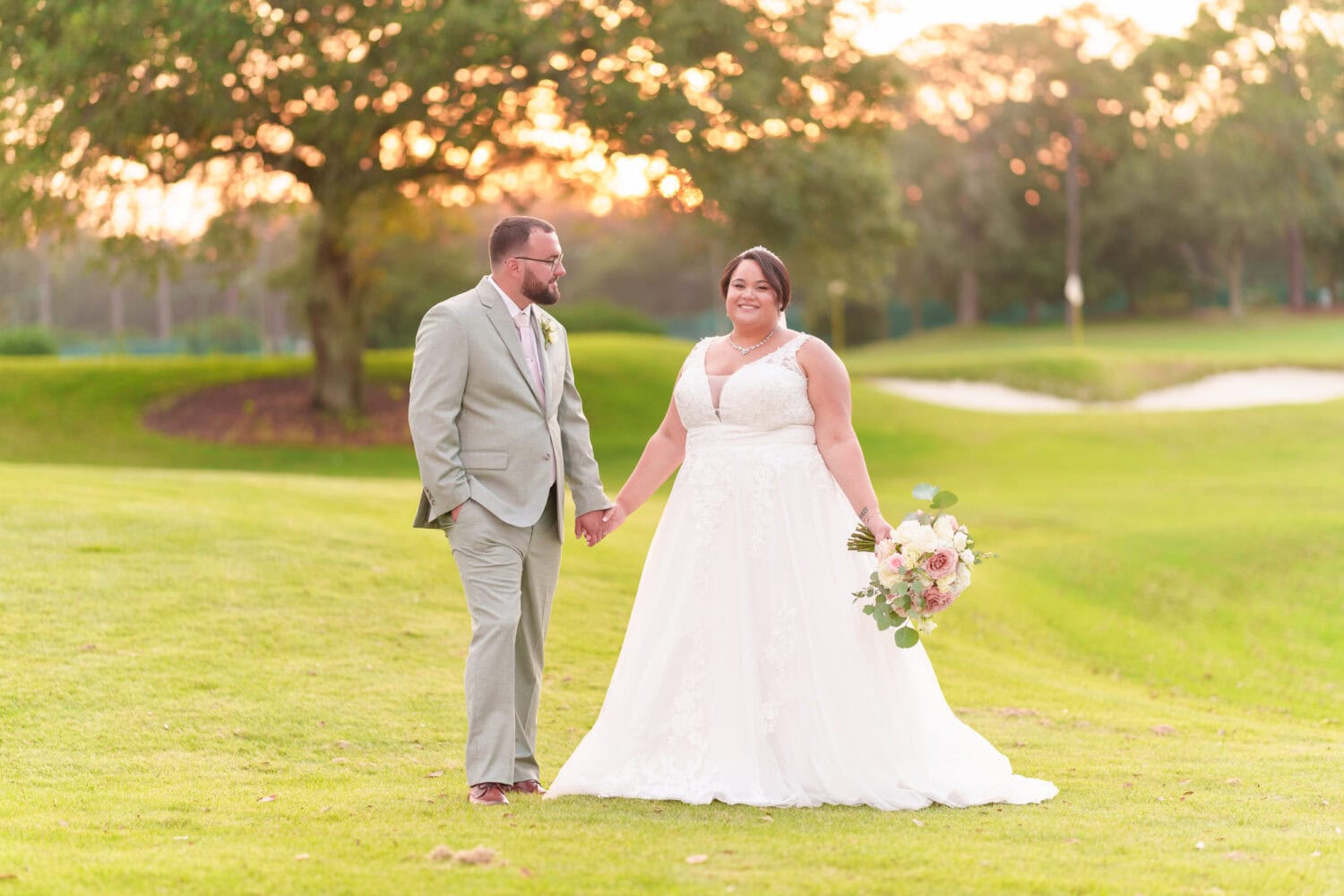 Groom looking at his beautiful bride - Dunes Golf & Beach Club