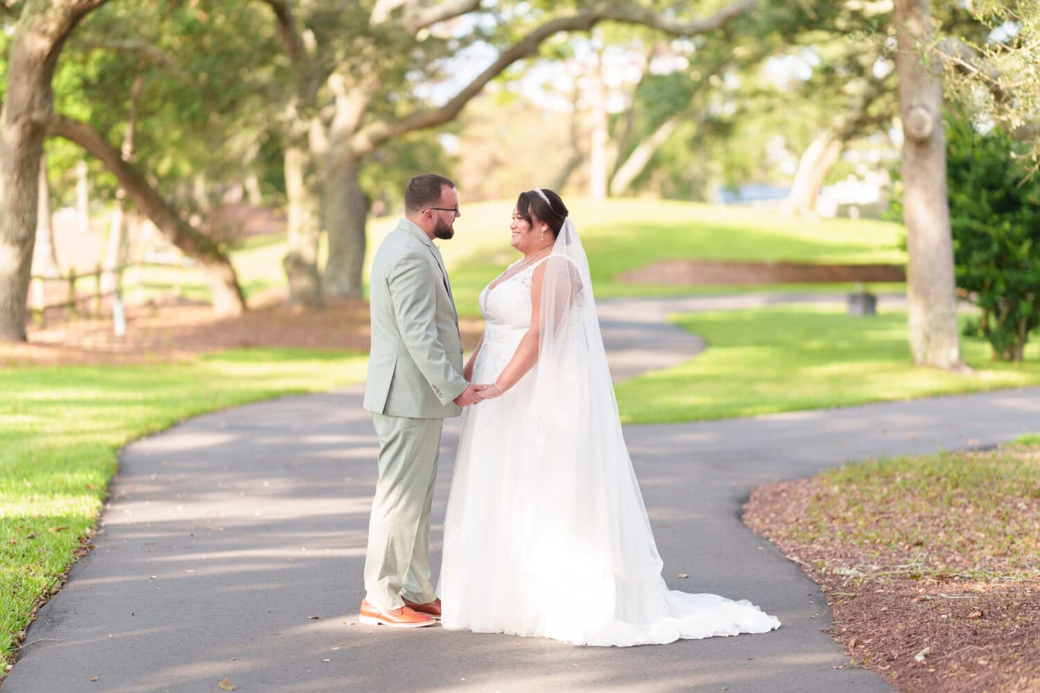 Holding hands under the oaks - Dunes Golf & Beach Club