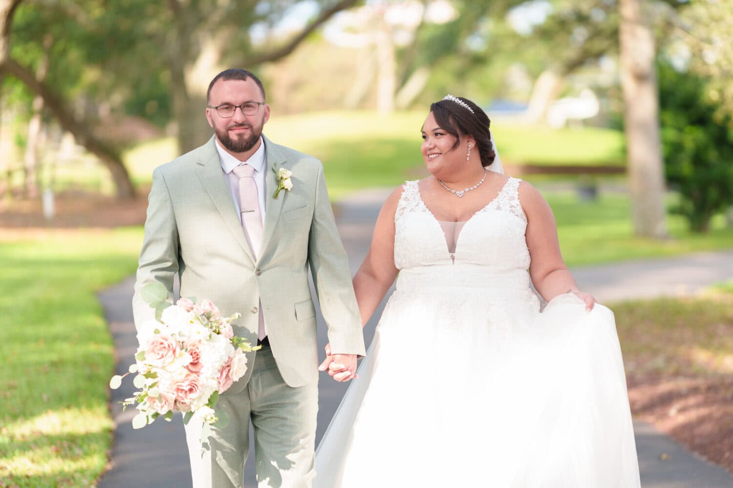 Holding hands walking together - Dunes Golf & Beach Club