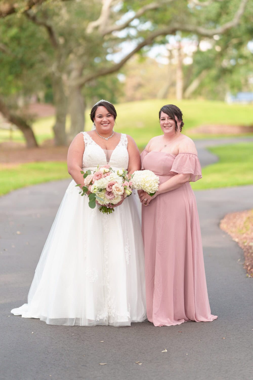 Individual portraits with the bridesmaids under the oaks - Dunes Golf & Beach Club