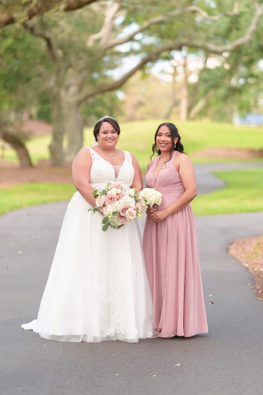 Individual portraits with the bridesmaids under the oaks - Dunes Golf & Beach Club