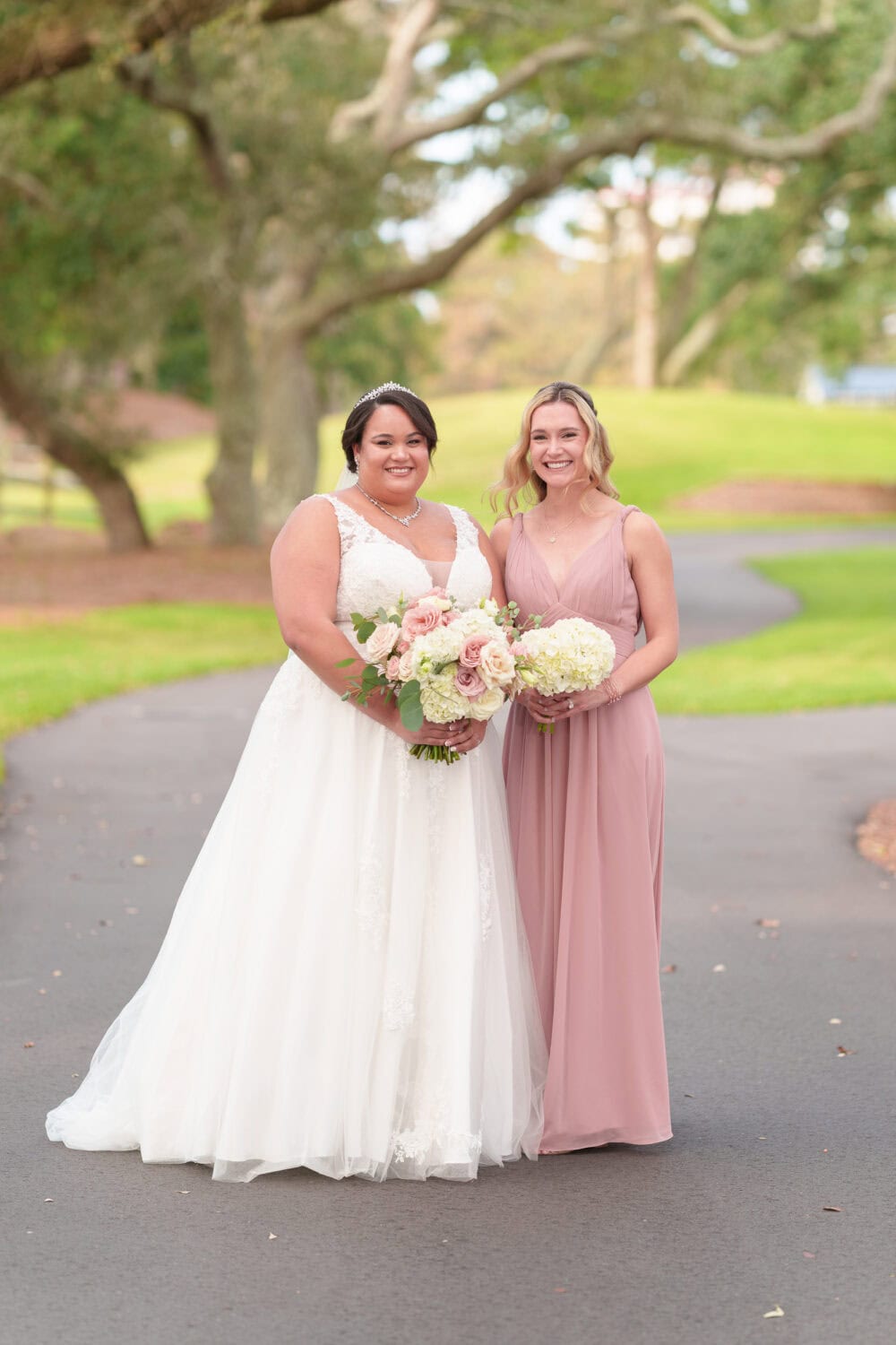 Individual portraits with the bridesmaids under the oaks - Dunes Golf & Beach Club