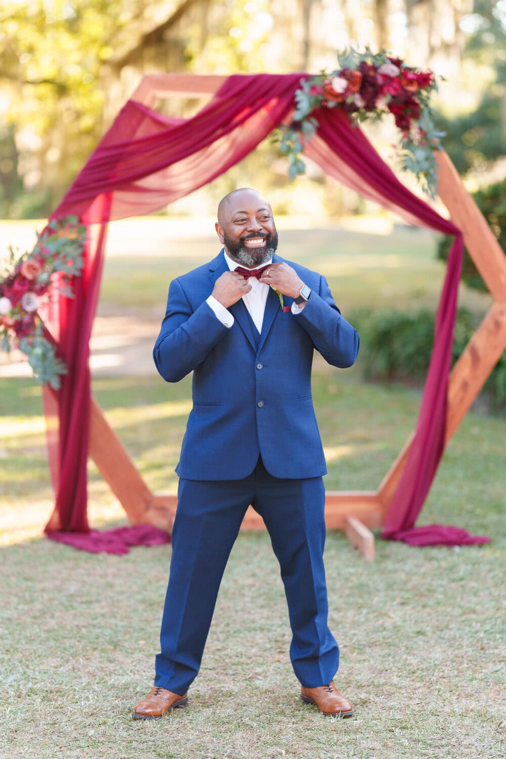 Groom posing for some pictures - Wedgefield Country Club