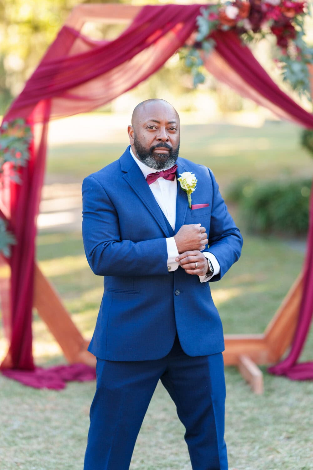 Groom posing for some pictures - Wedgefield Country Club