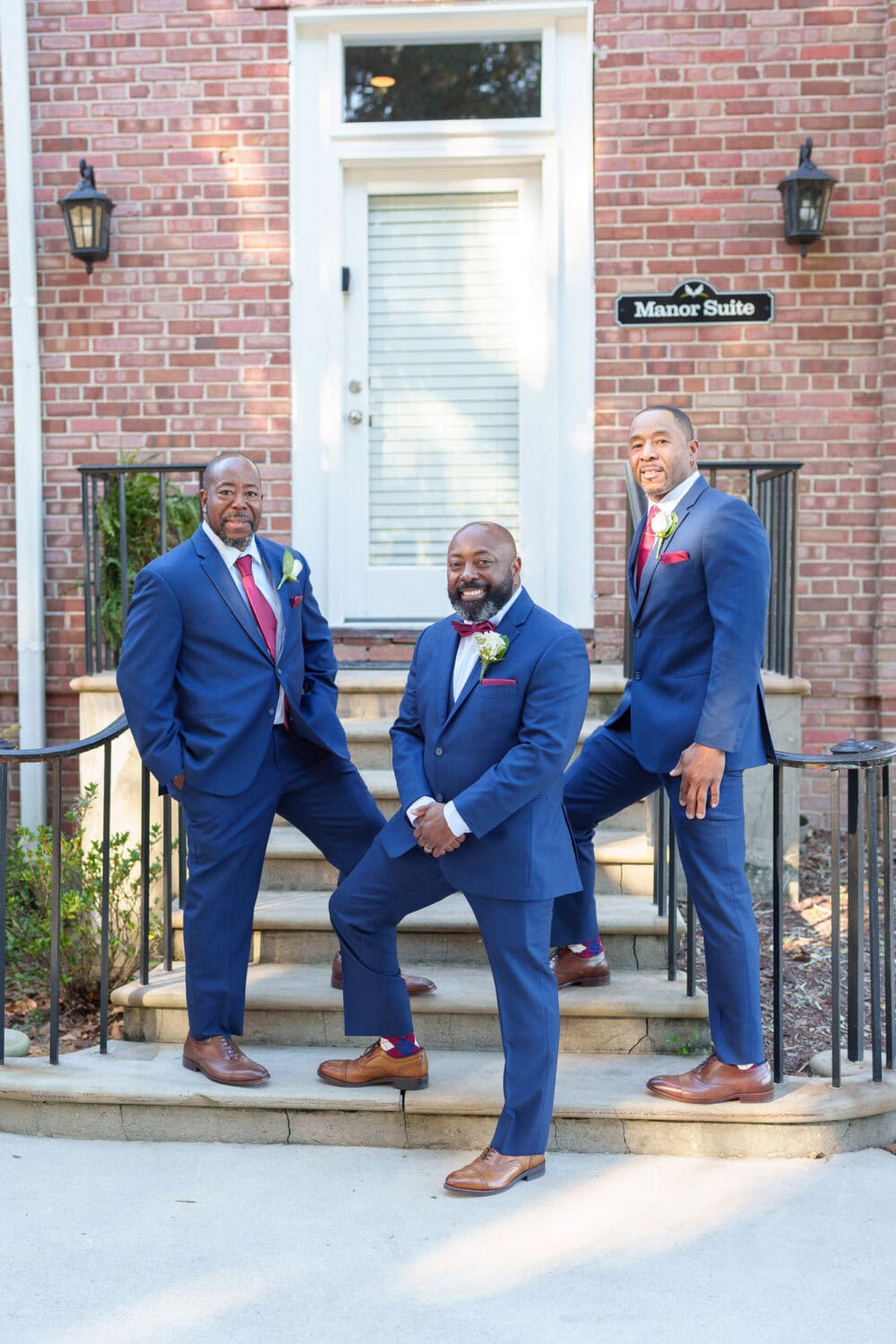 Groom with groomsmen on the steps - Wedgefield Country Club