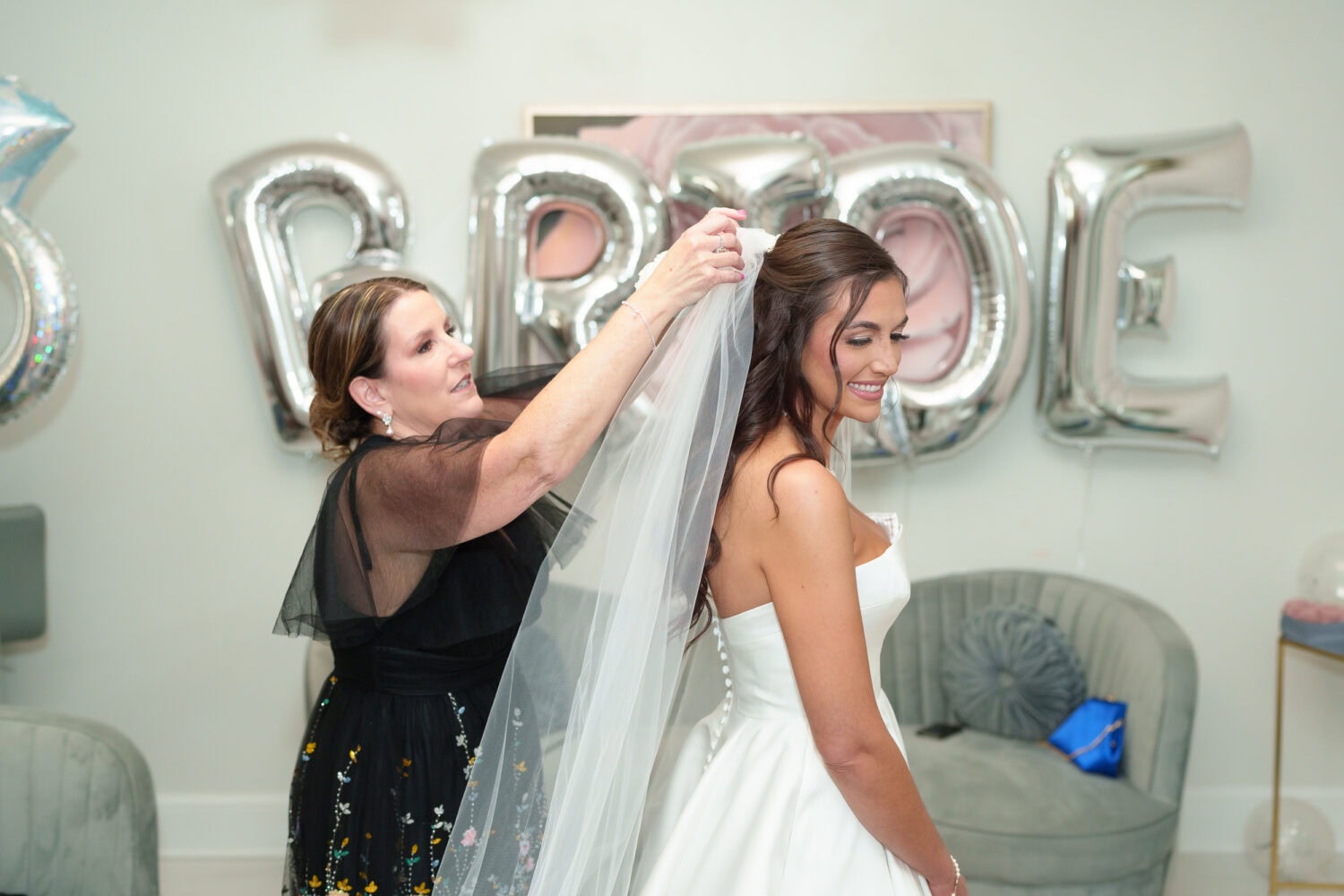 Mother helping bride with her veil - 21 Main Events - North Myrtle Beach