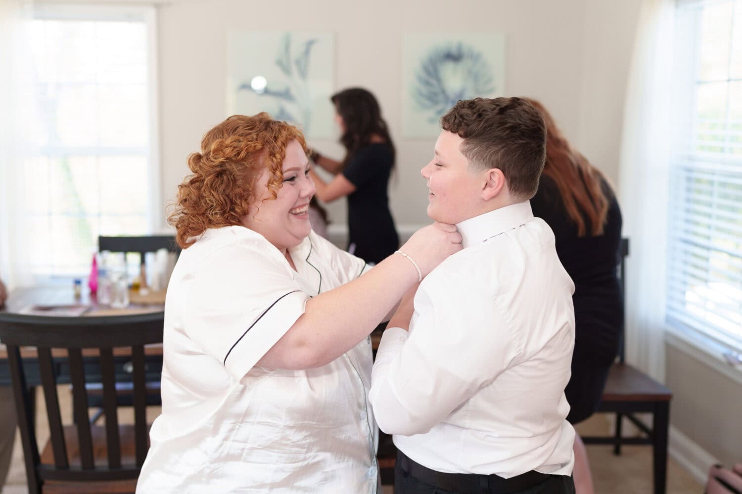 Bride helpding nephew with tie - The Cypress Inn - Conway, SC