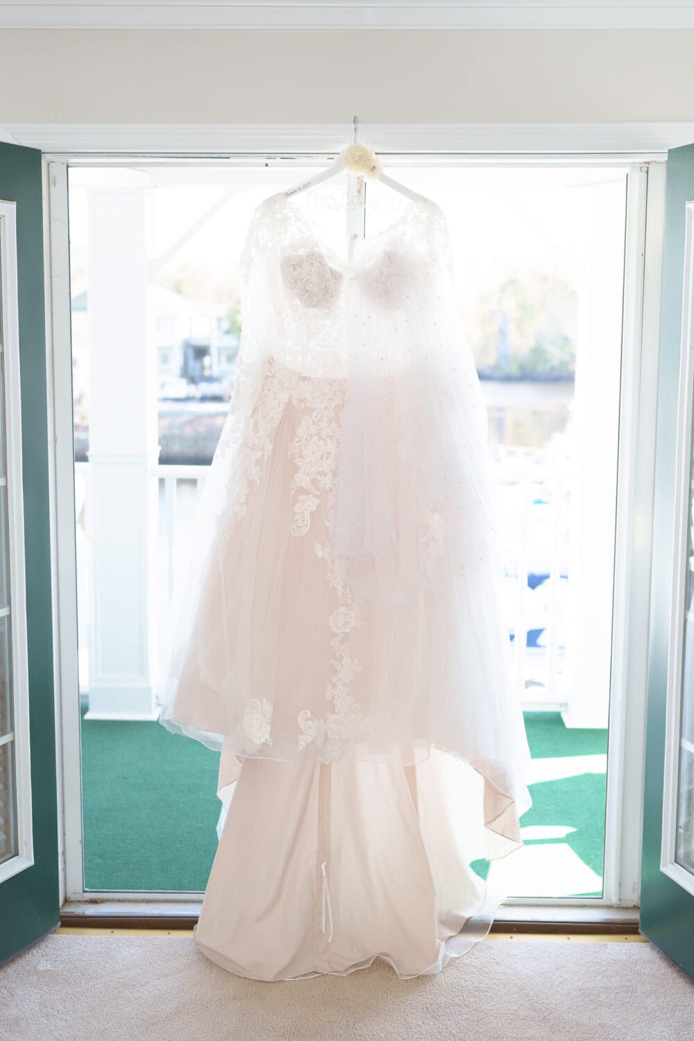 Dress hanging in the doorway - The Cypress Inn - Conway, SC